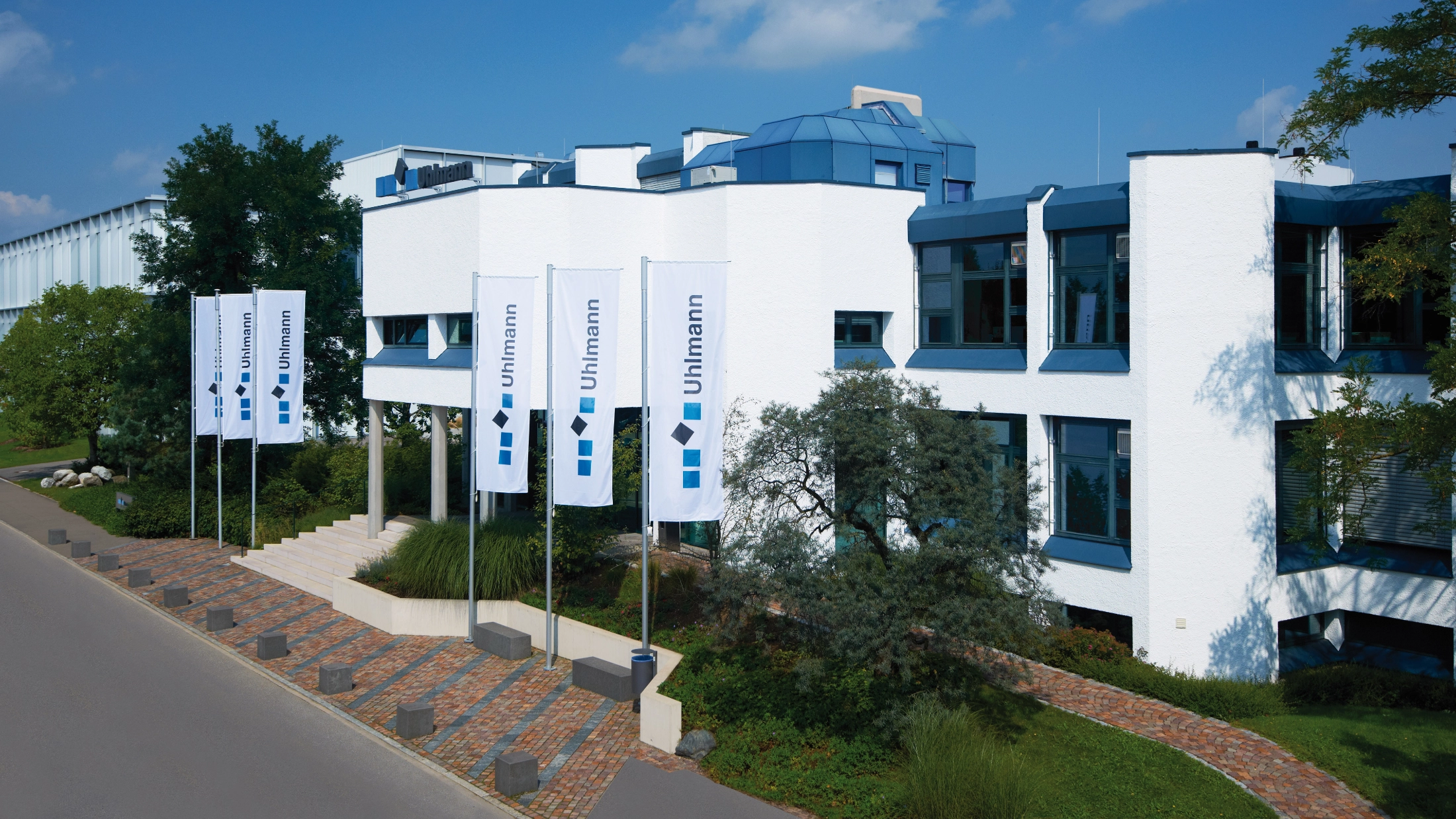 A photograph of the Uhlmann headquarter in Laupheim, Germany